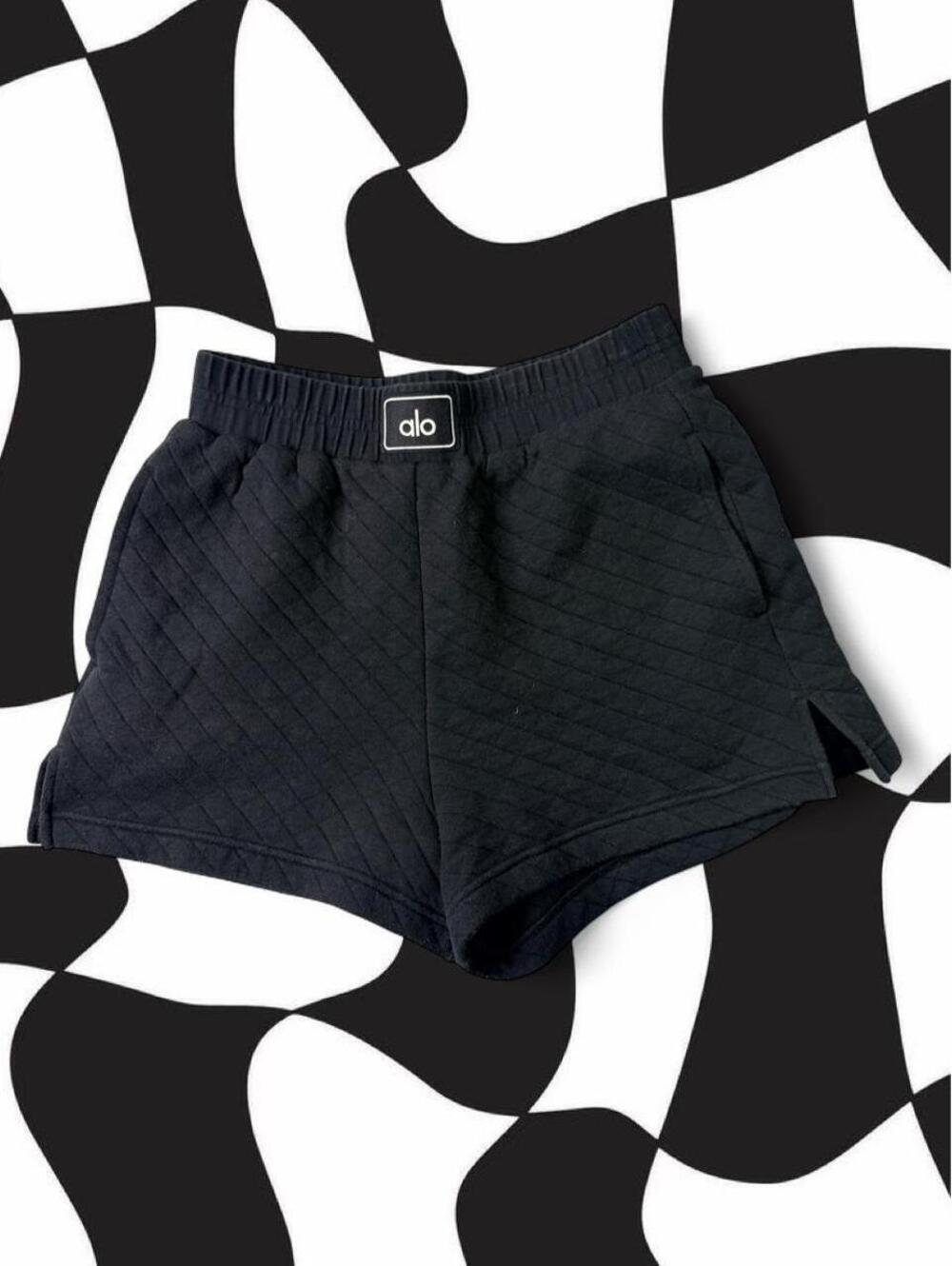 Alo Yoga black quilted shorts with diagonal stitching